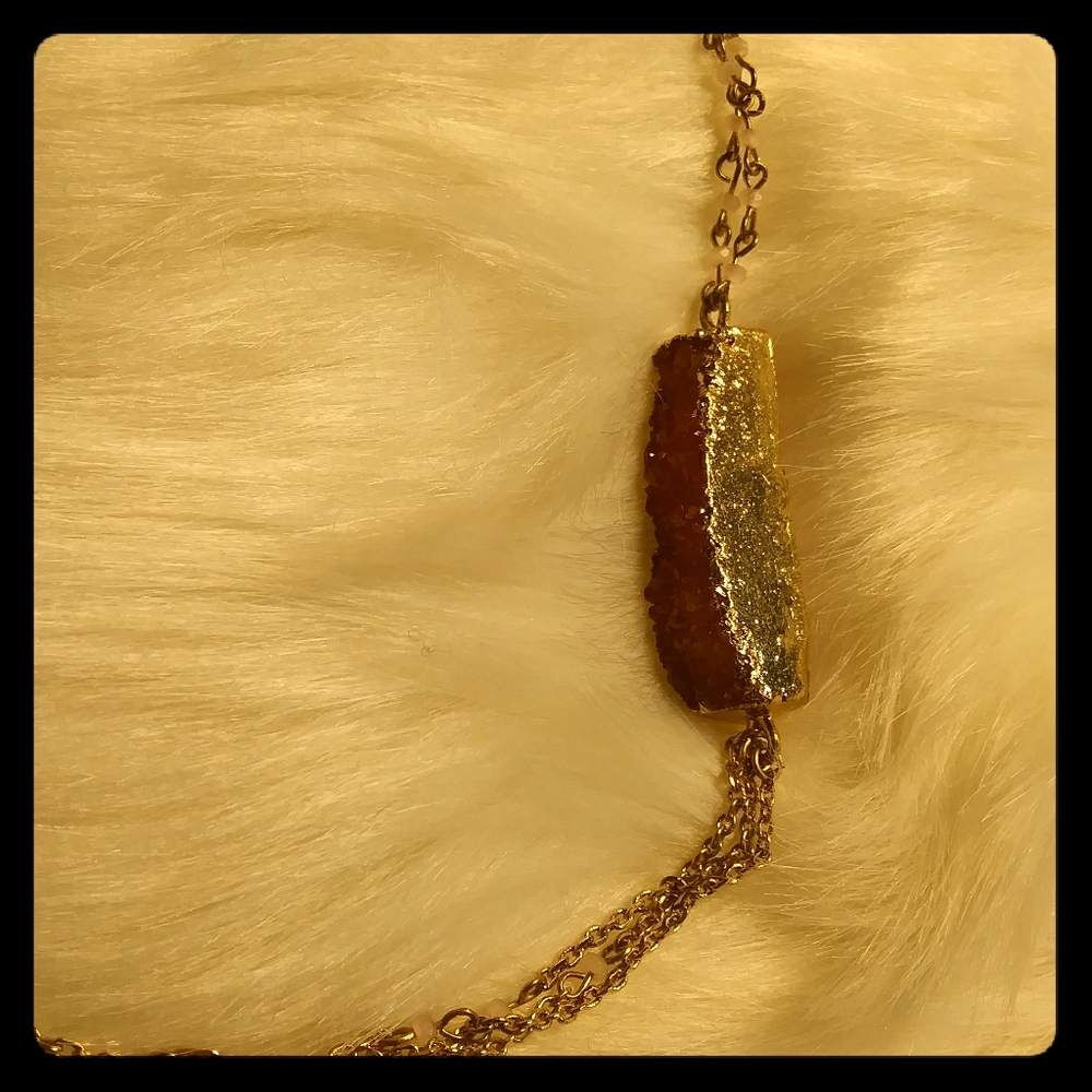 Delicate gold necklace w/ red stone